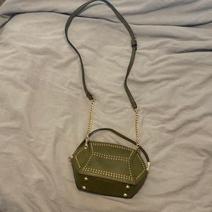 Cute army green small purse with gold detail.